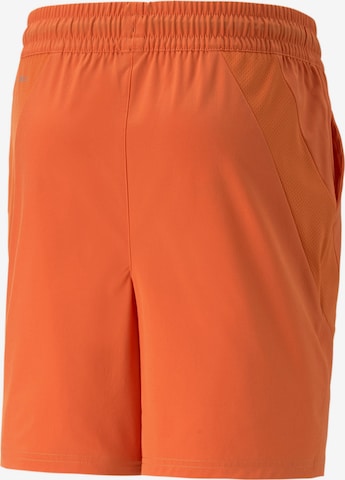 PUMA Regular Workout Pants in Orange