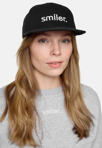 smiler. Snapback Cap shine. in Schwarz: predná strana