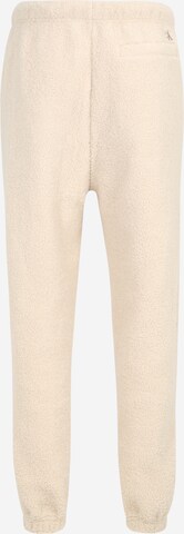 Effilé Pantalon Calvin Klein Jeans en beige
