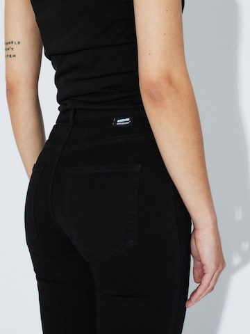 Dr. Denim Skinny Jeans 'Plenty Petite'‌‌ in Schwarz