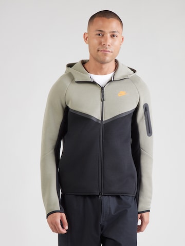 Nike Sportswear - Sudadera con cremallera 'Tech Fleece' en verde: frente