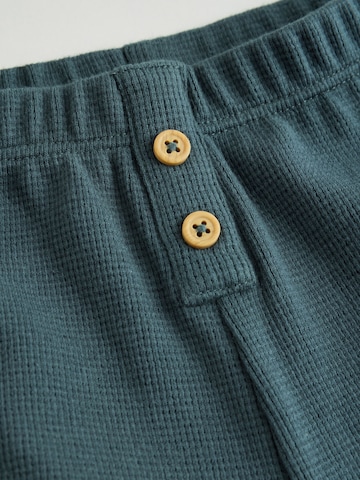 Set de la Next pe verde