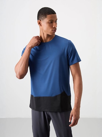 T-Shirt fonctionnel Tommy Life en bleu