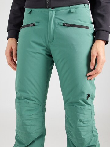 regular Pantaloni per outdoor 'Scoot' di PEAK PERFORMANCE in verde