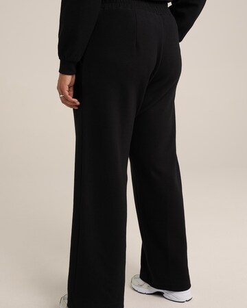 Flared Pantaloni di WE Fashion in nero
