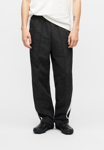 PUMA Regular Workout Pants in Black: front