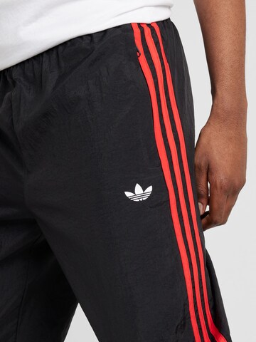 ADIDAS ORIGINALS Tapered Pants 'Rekive ' in Black