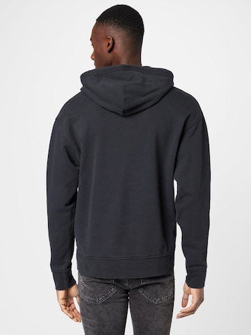 LEVI'S ® Regular Fit Sweatshirt 'Relaxed Graphic Hoodie' in Schwarz