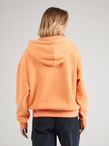 Felpa di Champion Authentic Athletic Apparel in arancione