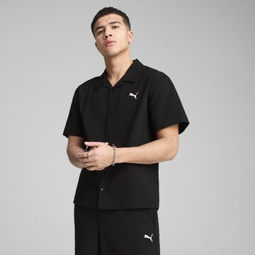 PUMA Comfort fit Functioneel shirt 'Wardrobe Ess' in Zwart: voorkant