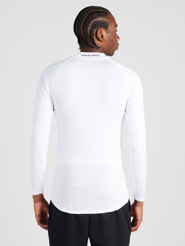 NIKE - Camiseta funcional 'Mock' en blanco