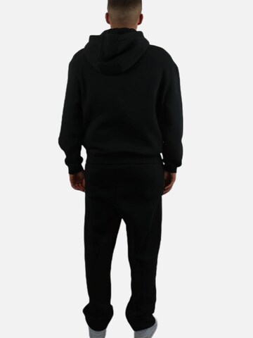 HEFTYKA Loosefit Sporthose 'OPEN LEG JOGGER'‌ in Schwarz