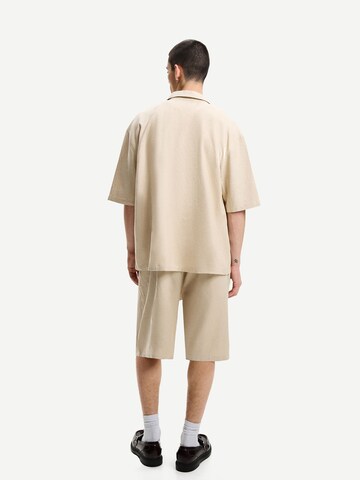 Loosefit Pantaloni di Bershka in beige