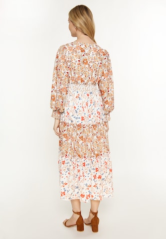 Usha Jurk in Oranje