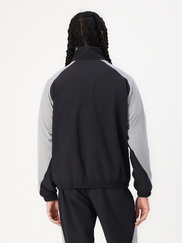 new balance Trainingsjack 'In Game' in Zwart