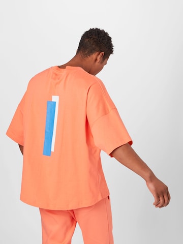 ABOUT YOU x Mero T-Shirt 'Kelkid' in Orange