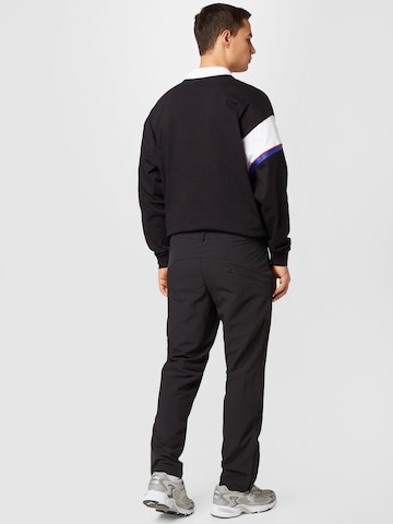 PUMA Regular Sports trousers in Black