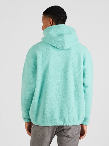 LEVI'S ® Bluzka sportowa 'Cozy Up Hoodie' w kolorze zielony