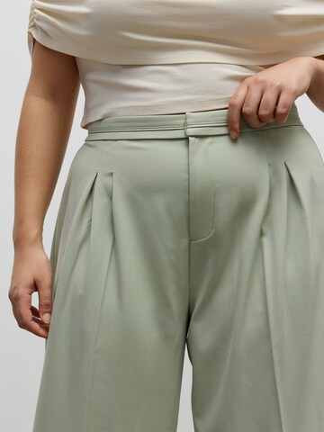 Wide leg Pantaloni con piega frontale di CITA MAASS in verde