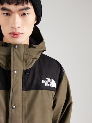 THE NORTH FACE Χειμερινό μπουφάν 'Mountain' σε πράσινο