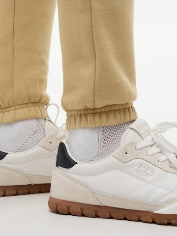 Effilé Pantalon Tommy Jeans en beige