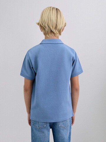 Coupe regular Chemise ' ' Scalpers en bleu
