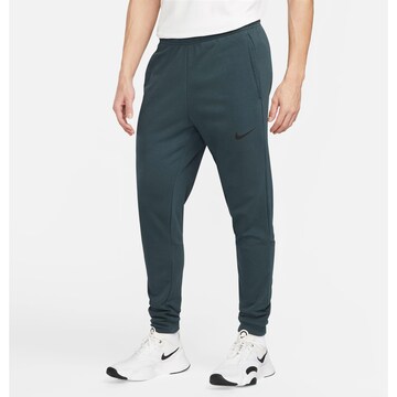 NIKE Tapered Workout Pants in Blue: front