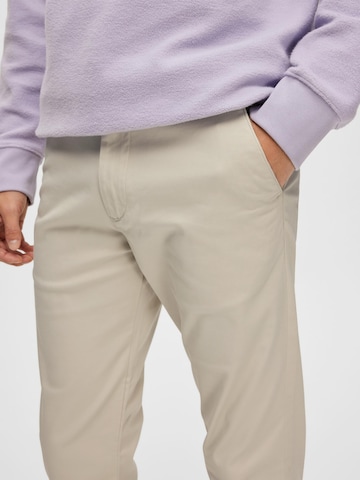 SELECTED HOMME Úzky strih Chino nohavice 'Miles Flex' - Sivá