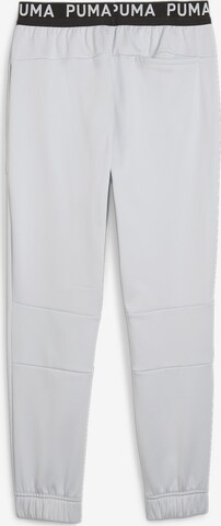 Effilé Pantalon de sport PUMA en gris