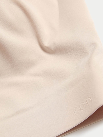 Top sportivo di Marks & Spencer in beige