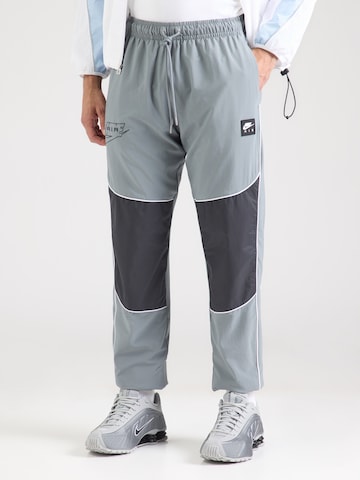Nike Sportswear Zwężany krój Spodnie 'AIR' w kolorze szary: przód