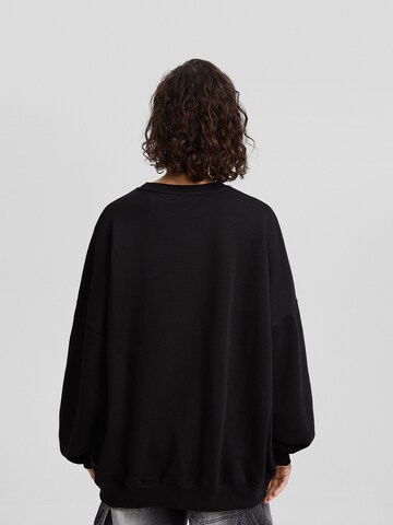 Sweat-shirt Bershka en noir