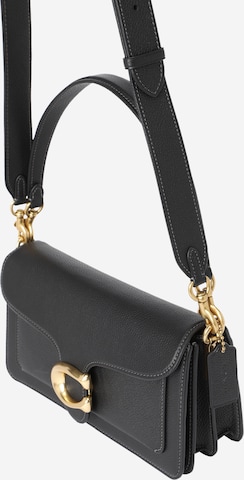 COACH - Bolso de mano en negro: frente