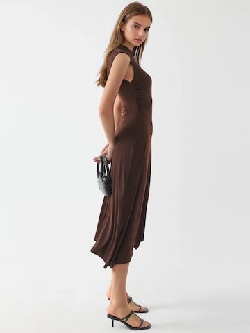 Abito di Busem in marrone