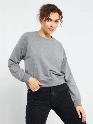 Sweat-shirt Tommy Life en gris