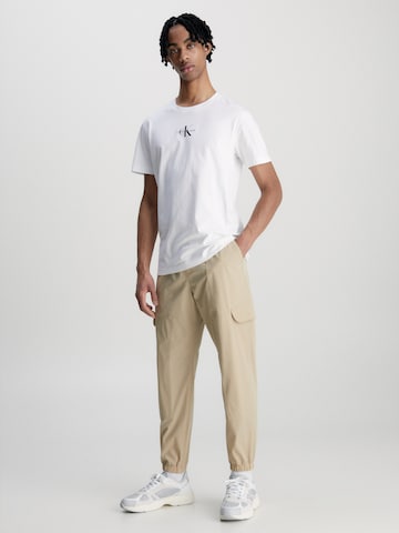 Tapered Pantaloni cargo di Calvin Klein Jeans in beige