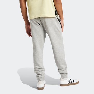 ADIDAS SPORTSWEAR Tapered Sportnadrágok 'FEELCOZY' - szürke