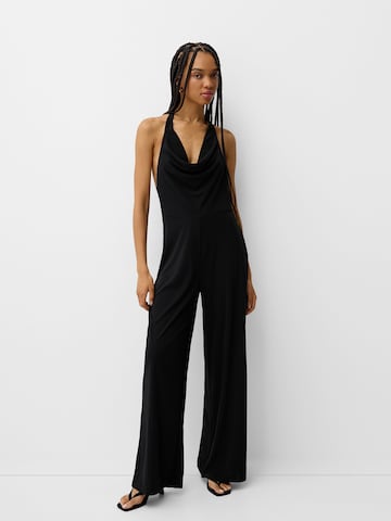 Salopeta de la Bershka pe negru: față