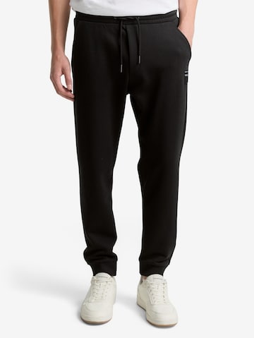 TOM TAILOR DENIMTapered Hlače - crna boja: prednji dio