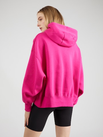 Nike Sportswear Bluzka sportowa 'Phoenix Fleece' w kolorze różowy