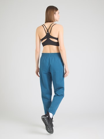 UNDER ARMOUR Tapered Sporthose in Blau