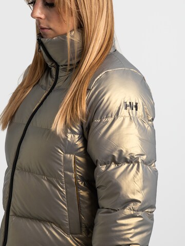 HELLY HANSEN Winterjas 'Jade' in Goud