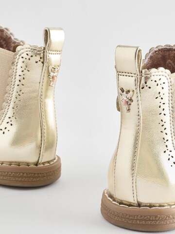 Bottes Next en or