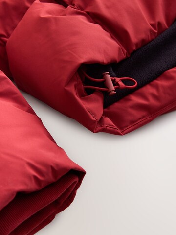 Geacă de iarnă de la Next pe roșu