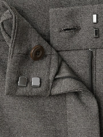 MANGO Loosefit Kalhoty s puky 'Carlota' – hnědá