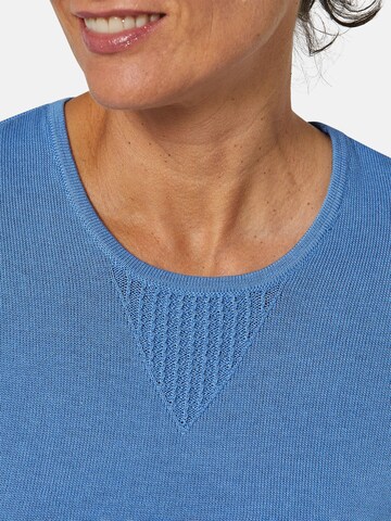 Goldner Pullover in Blau