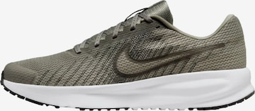 NIKE Sneakersy niskie 'Run Defy Road Running' w kolorze zielony: przód