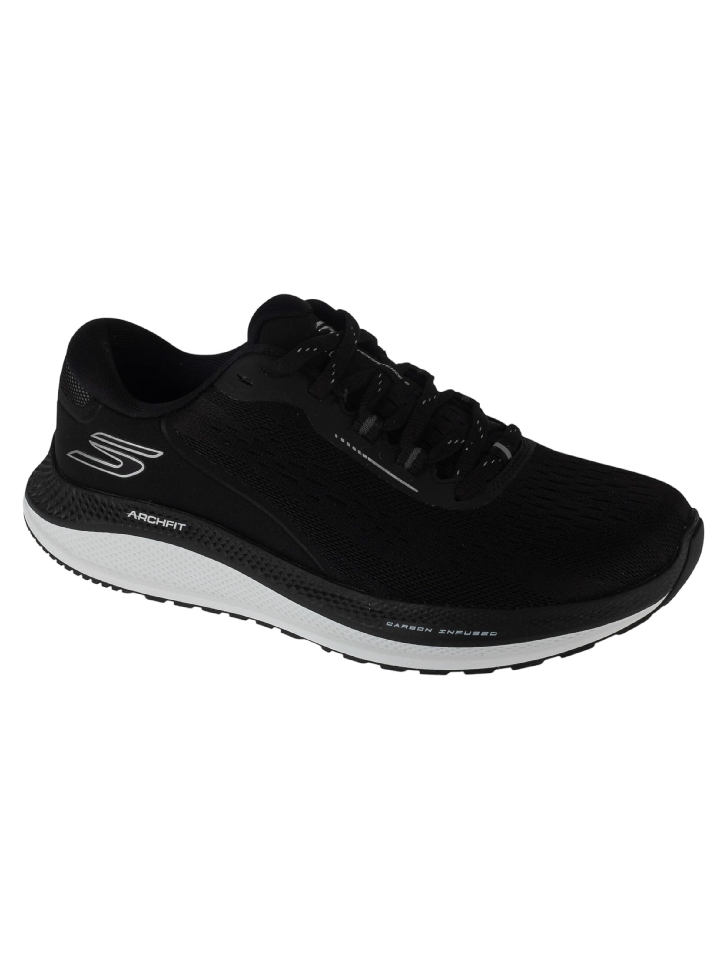 Baskets basses SKECHERS en noir : devant
