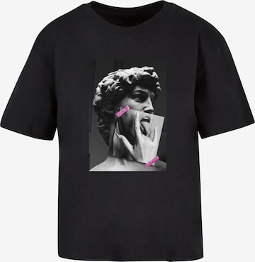 Miss Tee Paita 'Tongues Out' värissä musta: etupuoli