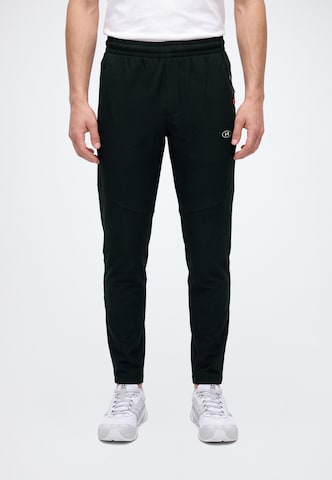 UNDER ARMOUR - Tapered Pantalón deportivo en negro: frente